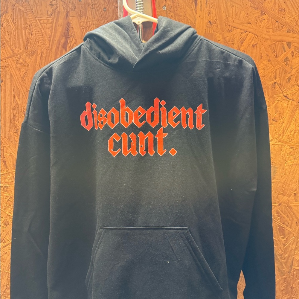 Black Hoodie with attention grabbing Red Graphic Text